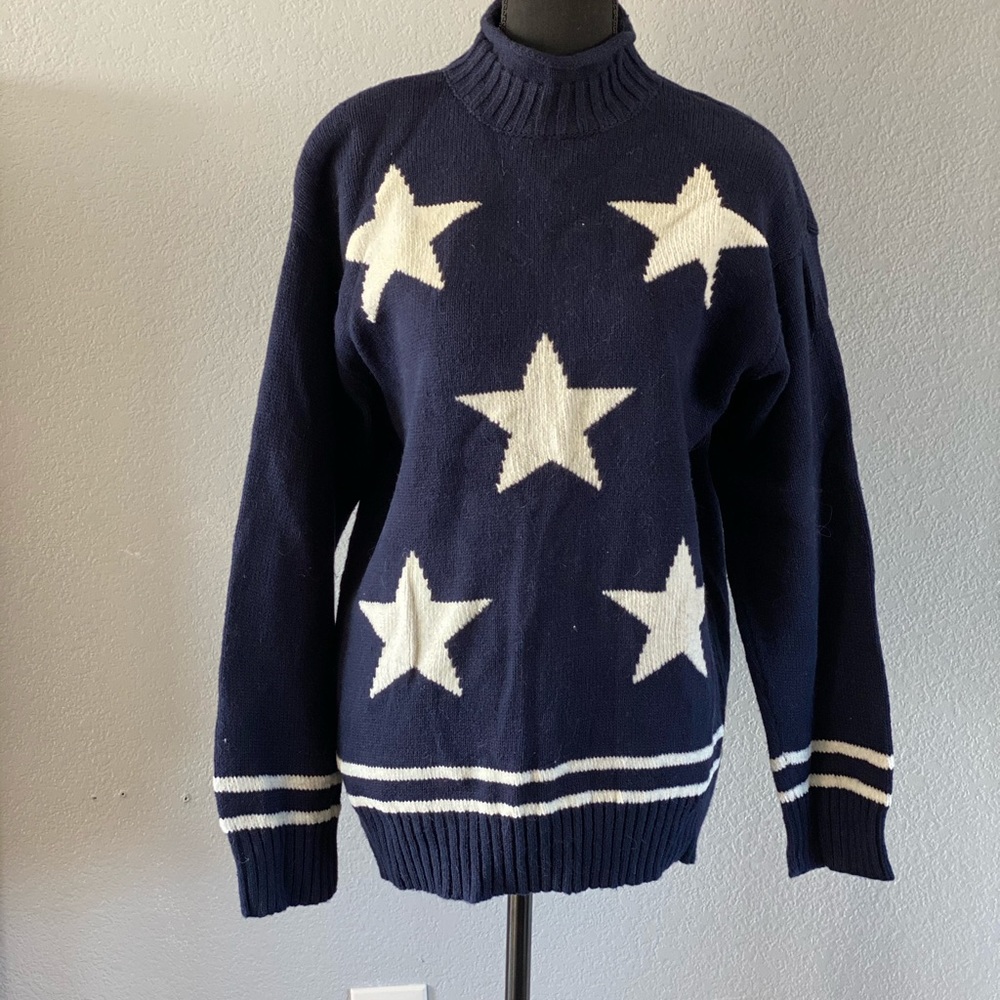 Women’s large navy blue sweater with white stars